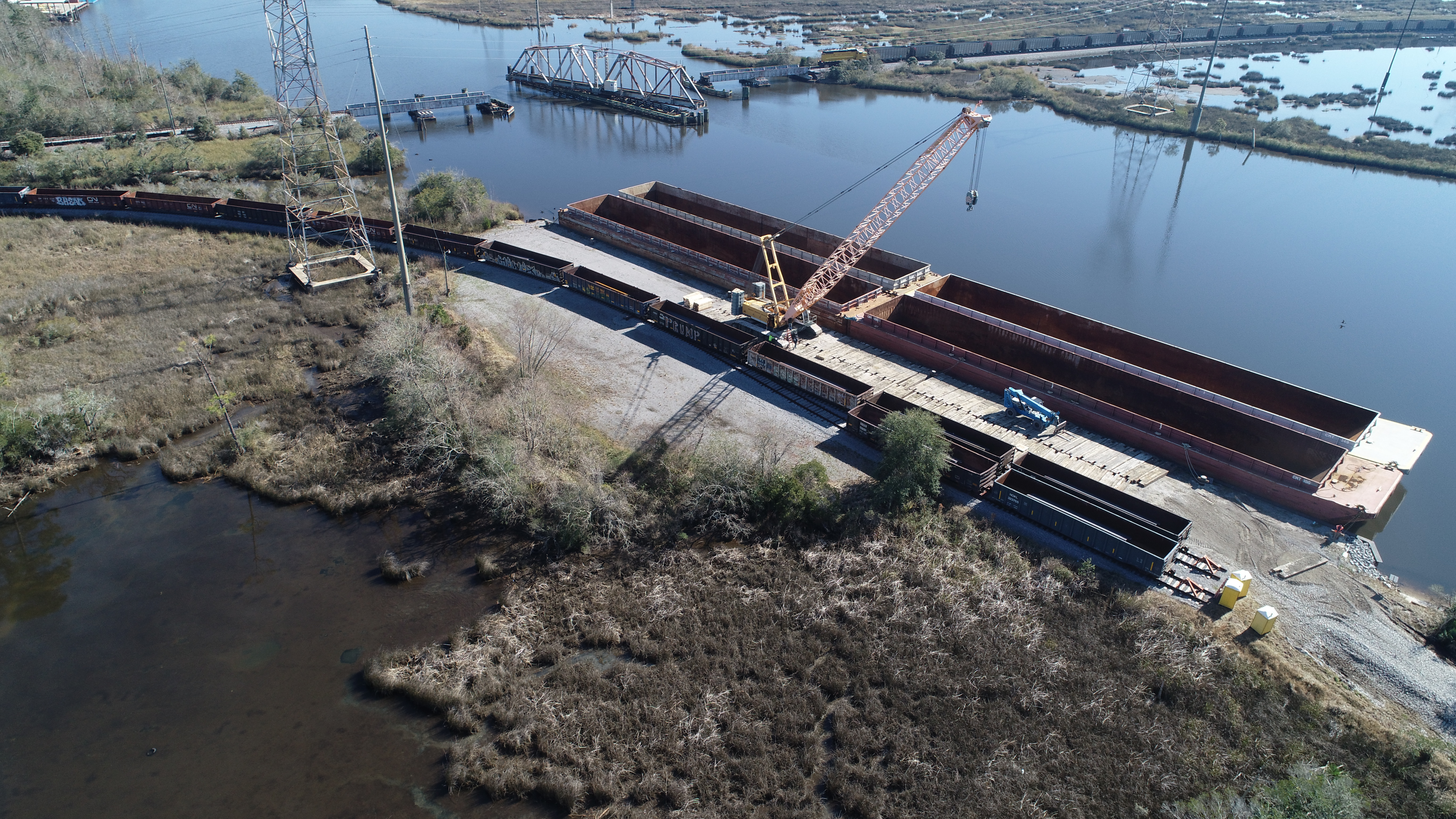 Steel slab unit train being transloaded at Escatawpa Barge Terminal